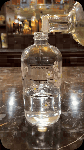Video showing how fast and simple it is to make a large batch Cosmo, Mai Tai or Cadillac Margarita. Easier than a freezer door drink. No measuring needed, no need to do something with the liquor that must be removed to make room for the batch cocktail.